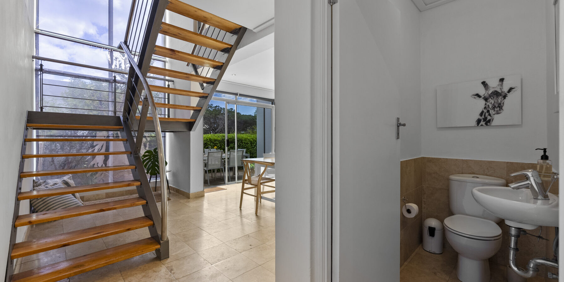 Townhouse apartment for sale in Camps Bay in secure complex near beach with pool and garden