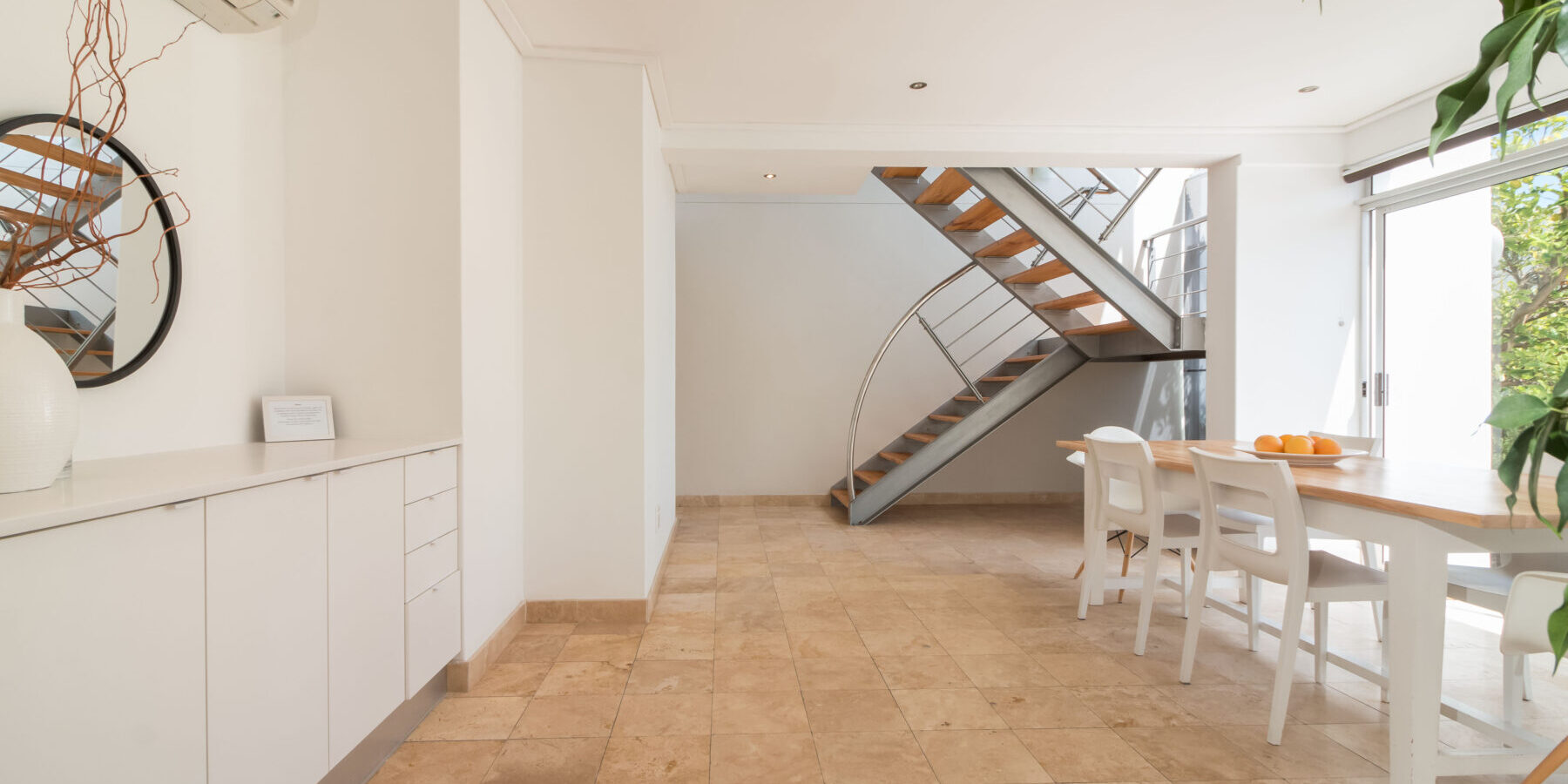 Townhouse apartment for sale in Camps Bay in secure complex near beach with pool and garden