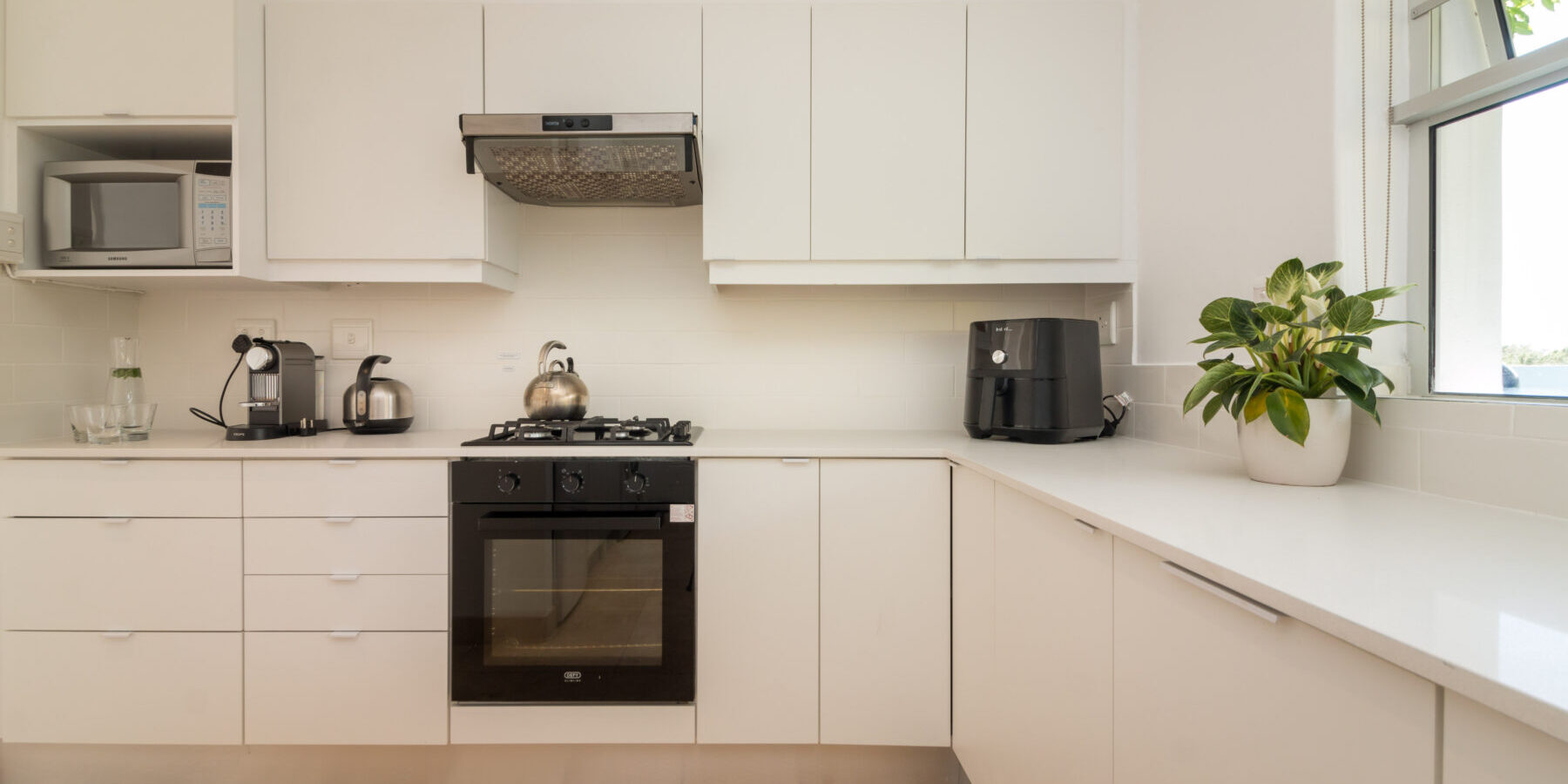 Townhouse apartment for sale in Camps Bay in secure complex near beach with pool and garden
