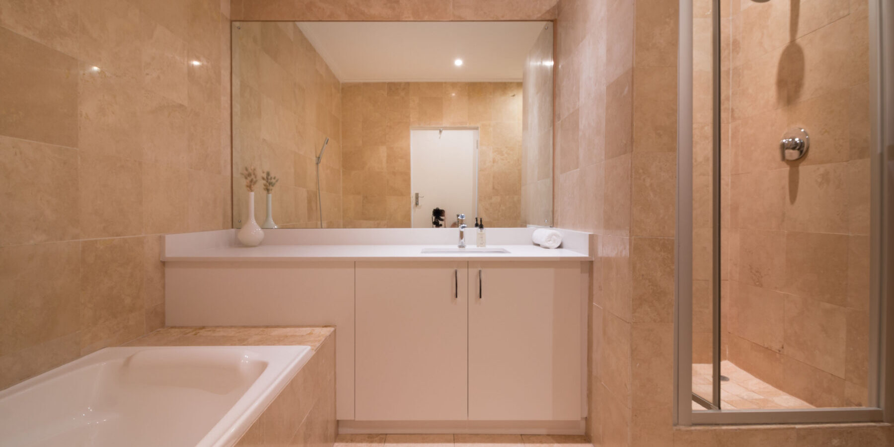 Townhouse apartment for sale in Camps Bay in secure complex near beach with pool and garden