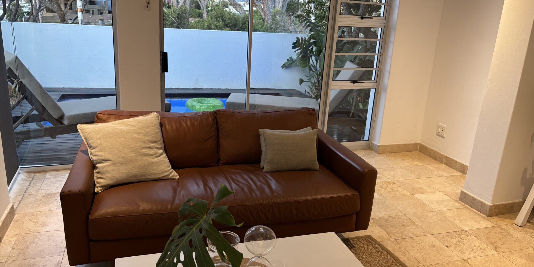 Townhouse apartment for sale in Camps Bay in secure complex near beach with pool and garden