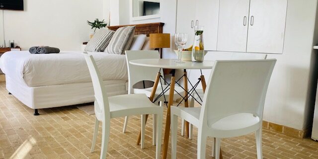 Digital Nomad studio to rent in Bakoven, Camps Bay. Close to the beach, work station, patio and garden
