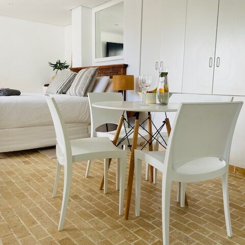 Digital Nomad studio to rent in Bakoven, Camps Bay. Close to the beach, work station, patio and garden